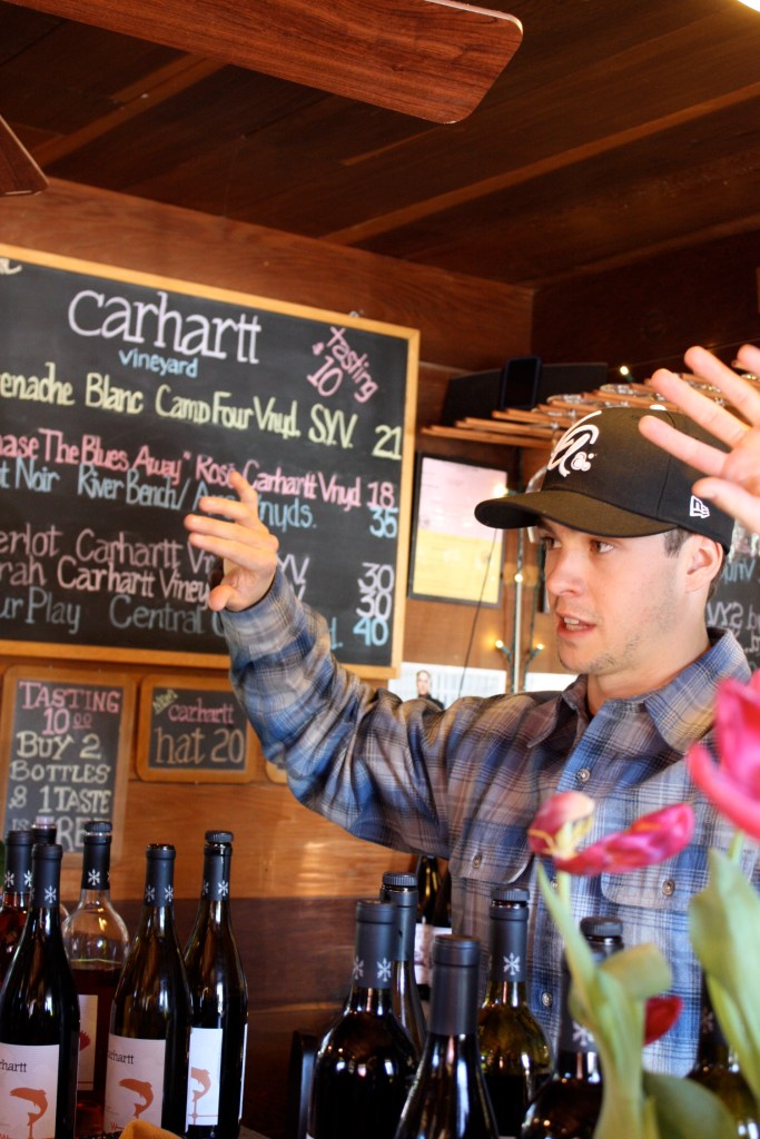 Chase Carhartt explaining the wines his family hand-crafts